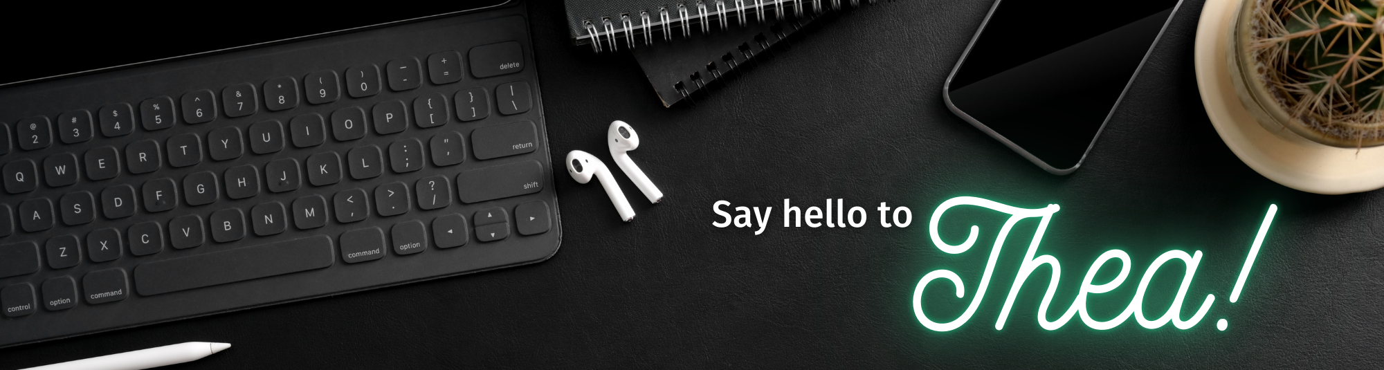 Image of desk top with keyboard and personal items along with text reading, "Say hello to Thea!"